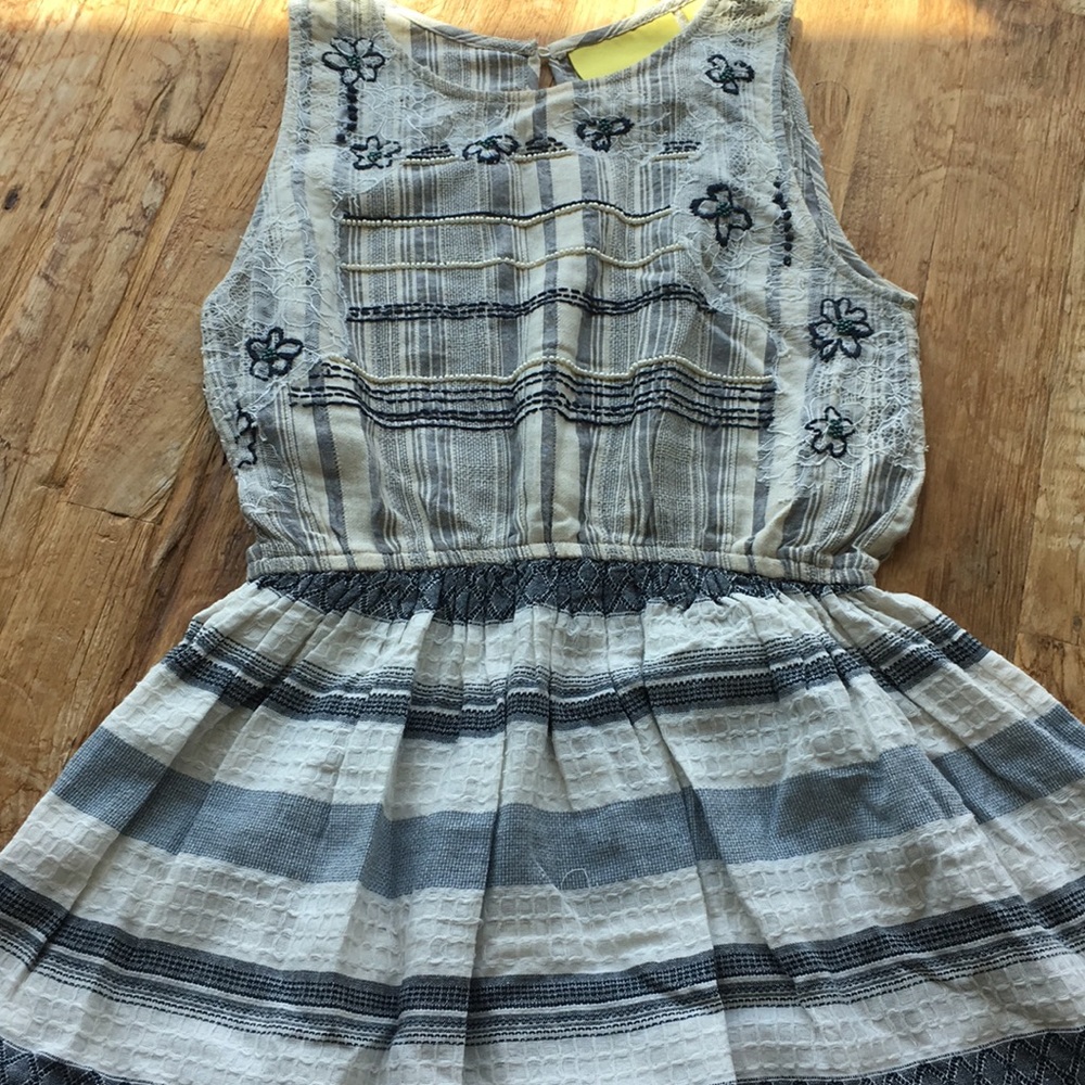 Anthropologie embroidered peplum tank